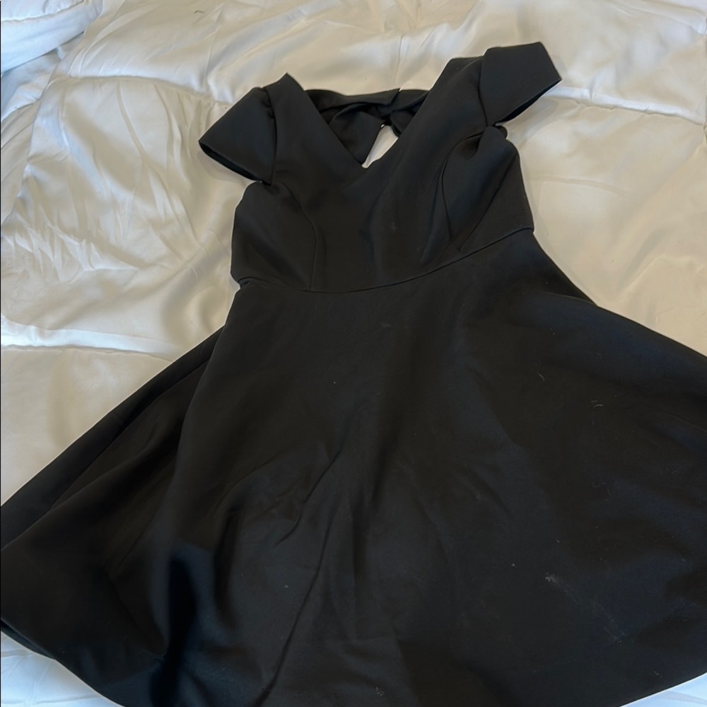 Elegant Black Dress with Bow Detail on Back